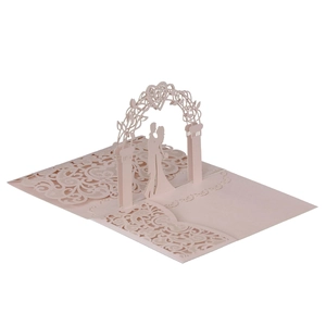 Detail view of pink 3D pop-up wedding card with laser-cut romantic couple heart design
