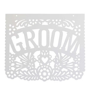 Detailed laser-cut white wedding banner featuring 'GROOM' text with bird and heart patterns