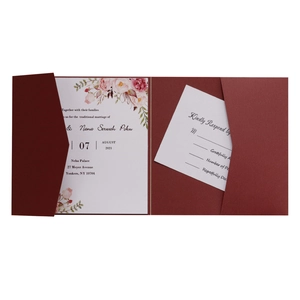 Elegant burgundy pocket wedding invitation set with floral card and RSVP on white background