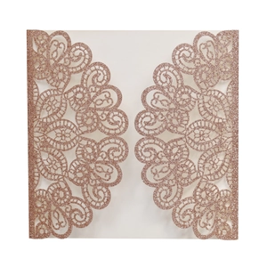 Detail of rose gold glitter laser-cut square wedding invitation sleeve with lace floral patterns