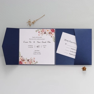 Floral wedding invitation set with navy trifold sleeve and RSVP card in pocket