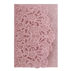 Detail of rose pink laser cut invitation with high-density glitter lace floral pattern