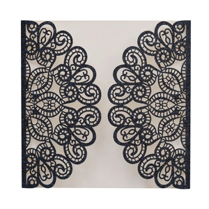 Detailed laser cut lace wedding invitation cover with blue glitter and floral patterns