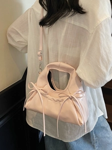 Sac bandoulière chic rose clair avec deux nœuds en cuir PU brillant pour femme