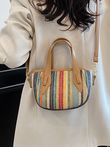 Sac seau tissé à rayures colorées avec poignées en cuir marron et une bandoulière