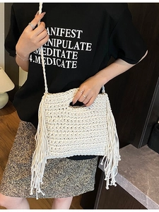 Summer woven crossbody bag with white knit texture and elegant bohemian tassels
