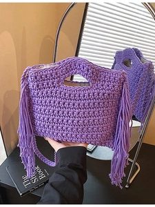 Handmade purple woven cotton handbag with tassels and shoulder strap for women