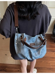 Retro washed canvas tote bag in blue with brown straps, large capacity shoulder handbag