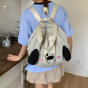 Detail of Pochacco-style nylon backpack with plush 3D ears and cute animal embroidery