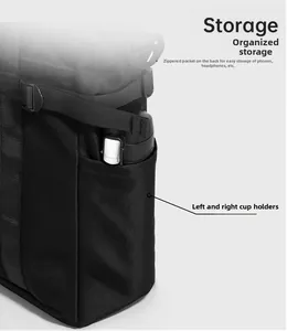 Detail of black nylon tote bag with side mesh pocket holding a vacuum flask