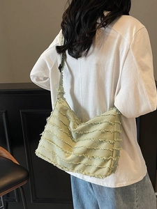 Large capacity light green canvas tote bag with fringe details for fashion daily use