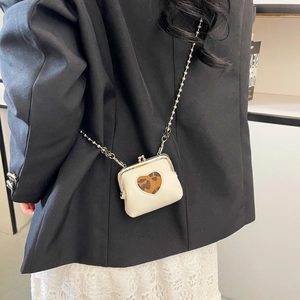 Mini cream leather crossbody bag with heart leopard print and silver chain strap details