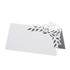 Laser cut hollow flower place card made of white pearlescent paper for wedding table decor