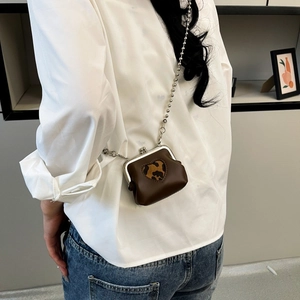 Mini brown leather kiss-lock bag with heart leopard print and silver chain strap