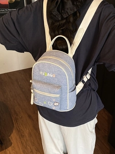 Contrast denim backpack with MY BAG embroidery and cute charms in light blue and white