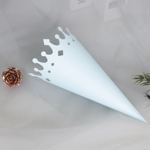 Detail of light blue cone with hollow crown design and elegant floral lace patterns