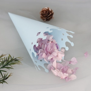 Light blue crown hollow paper cone for wedding flower petals on soft white mesh background