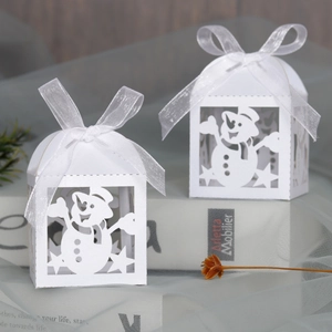 Detailed laser-cut Christmas snowman gift box featuring an elegant white organza ribbon bow