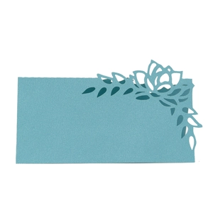 Detailed laser-cut floral pattern on sky blue pearlescent paper table name card
