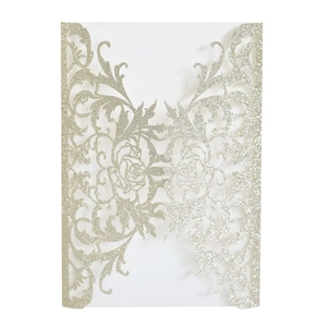 Detail of laser-cut rose hollow pattern on champagne gold glitter wedding invitation