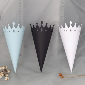Hollow crown paper cones for wedding petals in sky blue, black, and white colors