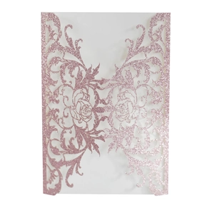 Detailed laser-cut rose floral pattern on glittery rose gold wedding invitation cover