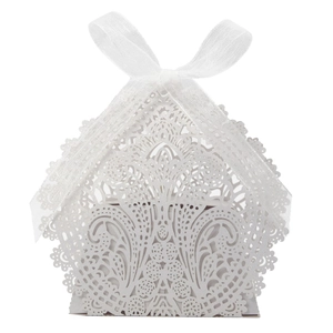 Detailed laser-cut lace floral pattern on white paper wedding favor gift box with ribbon