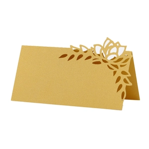 Elegant gold hollow rose place cards with laser-cut floral design for wedding parties
