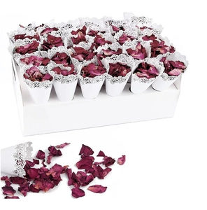 Lace hollowed wedding petal cones set with dried red rose petals on white display tray