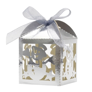 Silver laser-cut snowman gift box with metallic finish and lavender chiffon ribbon bow
