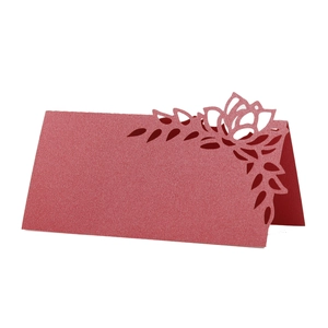 Elegant red laser-cut floral place card made of premium pearlescent paper for weddings