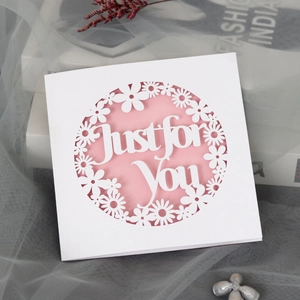 Pink daisy hollow greeting card with Just for You laser cut design on white paper
