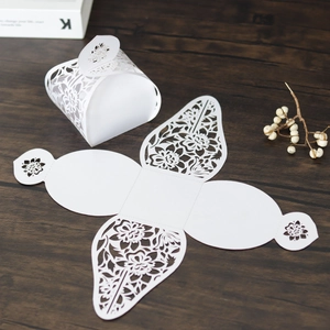 Detailed laser cut white floral gift box shown in both assembled and flat template views