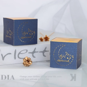 Dark blue square Eid Mubarak candy boxes with golden moon cutout and foil stamping