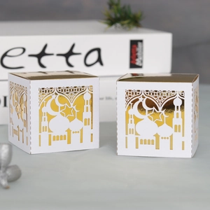 Detailed laser-cut Ramadan candy box featuring moon, star and mosque patterns