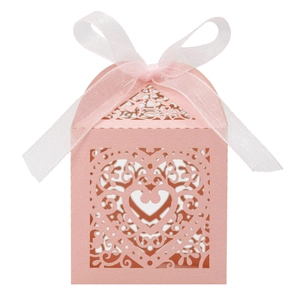 Detailed laser-cut heart hollow pattern on pink paper wedding favor candy gift box