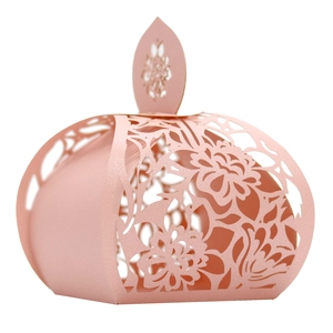 Detail of pink laser-cut rose hollow candy box with pearl paper finish for wedding gifts