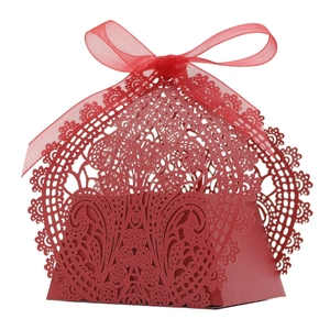 Red laser-cut lace candy box with ribbon bow for weddings and parties