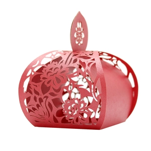 Elegant gold rose hollow-out wedding candy box with laser-cut floral patterns and handle