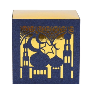 Intricate laser-cut mosque and crescent moon design on a blue and gold gift box