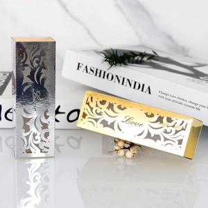 Detailed laser cut gold and silver Love gift boxes with intricate floral hollow patterns