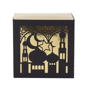 Detail view of Eid Mubarak gift box with laser-cut mosque and crescent moon pattern