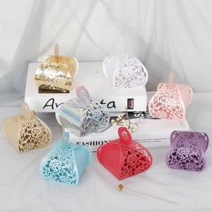 Laser-cut floral favor boxes in eight elegant colors for weddings and parties