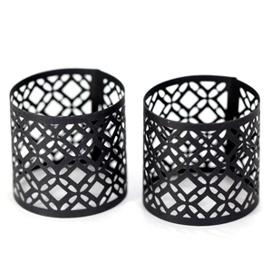 Detail of black laser-cut geometric hollow pattern on decorative LED candle paper lampshades