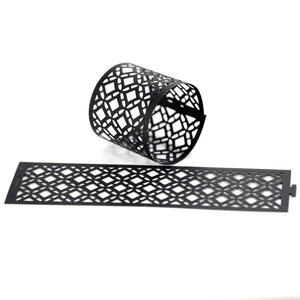 Detail of laser-cut black hollow decorative ring for parties with geometric patterns