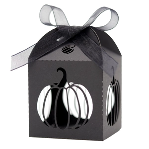 Laser-cut black Halloween pumpkin candy box with ribbon handle and hollow-out design