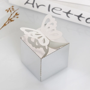 Detailed view of square silver butterfly candy box with mirror finish for wedding party
