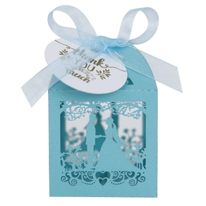 Light blue laser-cut wedding favor box with ribbon and Thank You hang tag