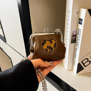 Mini dark brown leather crossbody bag with leopard print heart patch and silver chain