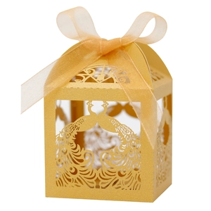 Detailed laser-cut peacock pattern on golden wedding candy box with a ribbon bow